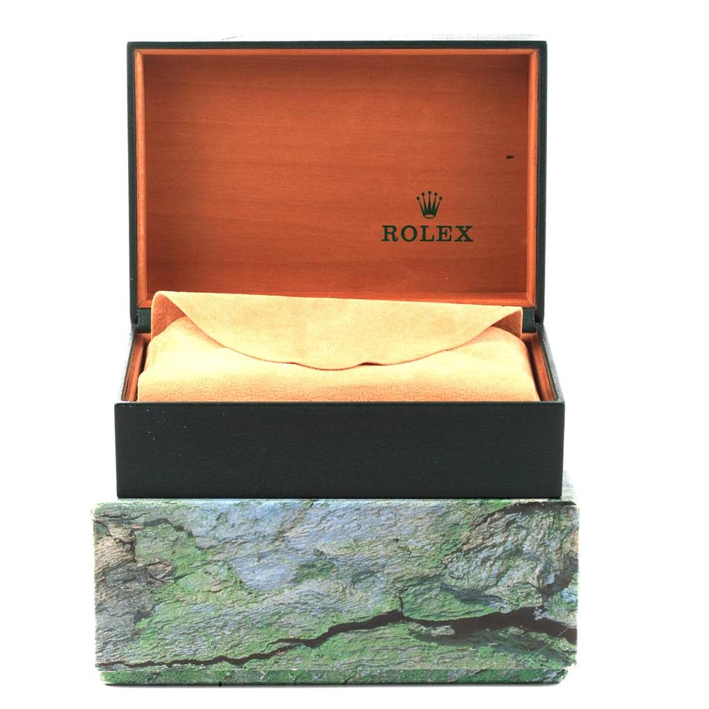 This image shows an open box for a Rolex Submariner 14060 Men's Stainless Steel Black Dial 14060 Men's Stainless Steel Black Dial watch, with the inner cushion and the brand logo visible.