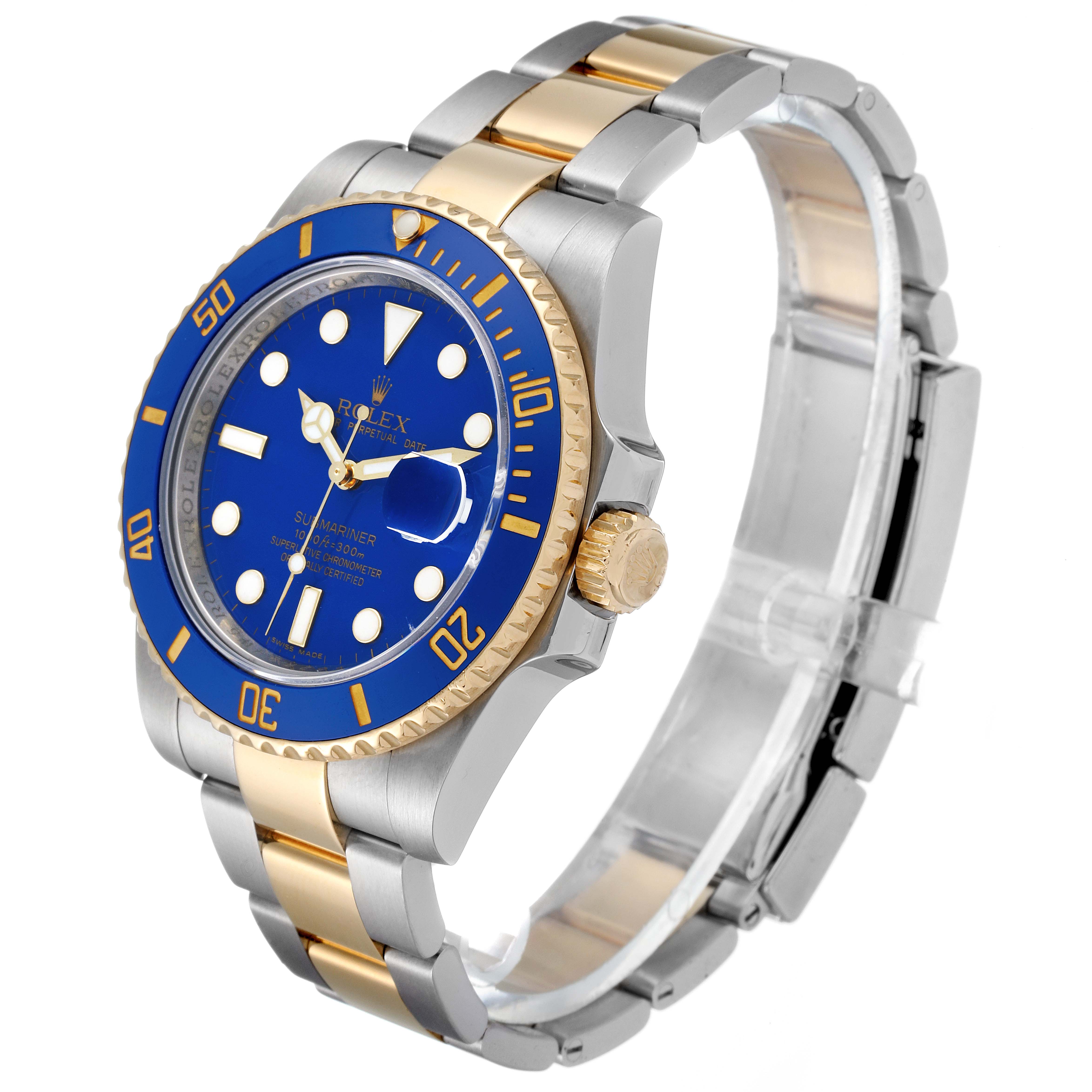 The image shows a Rolex Submariner 116613 Men's Steel and Gold (two tone) Blue Dial 116613 Men's Steel and Gold (two tone) Blue Dial watch at a slight angle, displaying its blue dial, bezel, and two-tone metal bracelet.