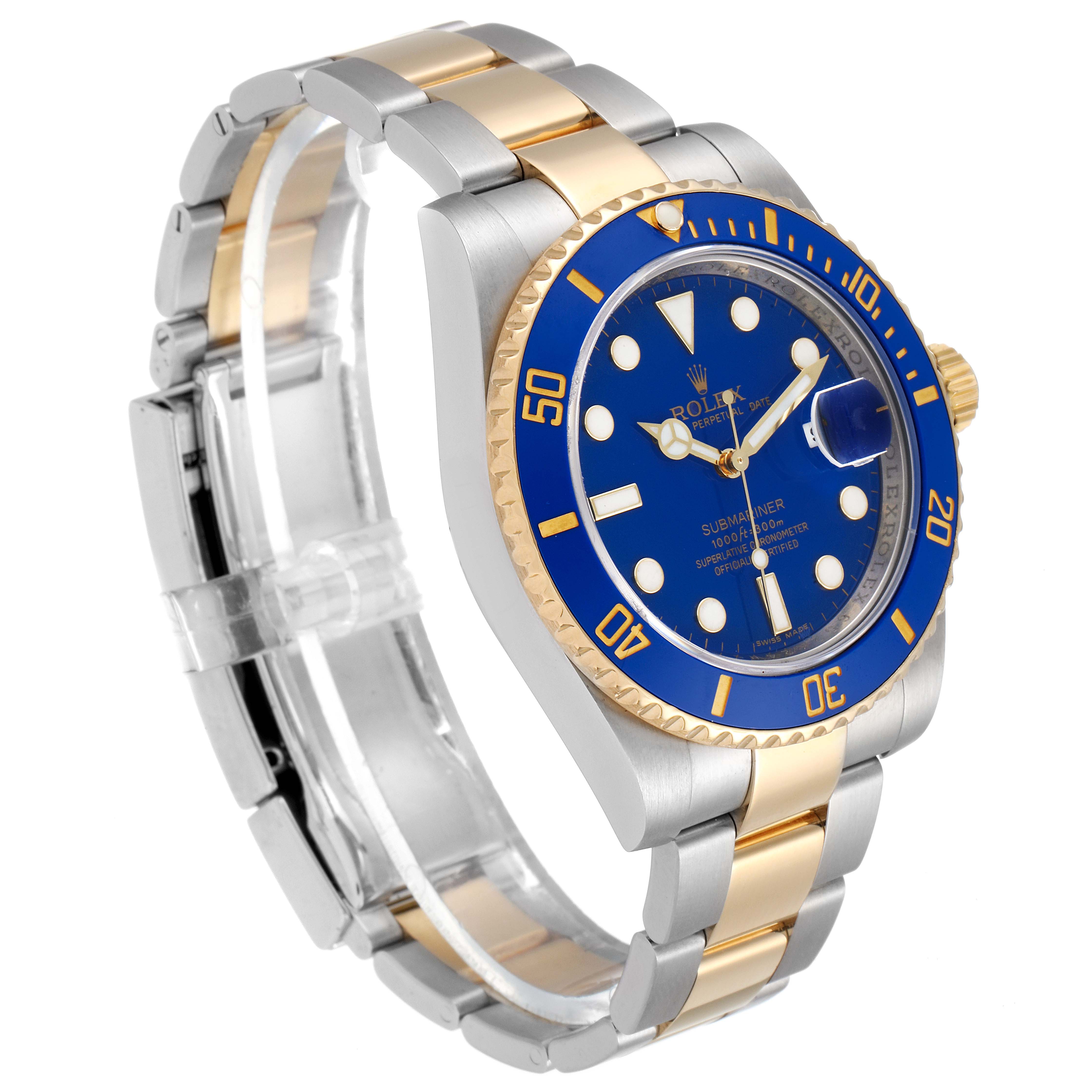 This photo of a Rolex Submariner 116613 Men's Steel and Gold (two tone) Blue Dial 116613 Men's Steel and Gold (two tone) Blue Dial watch shows a three-quarter view focusing on its blue dial, gold bezel, and two-tone bracelet.
