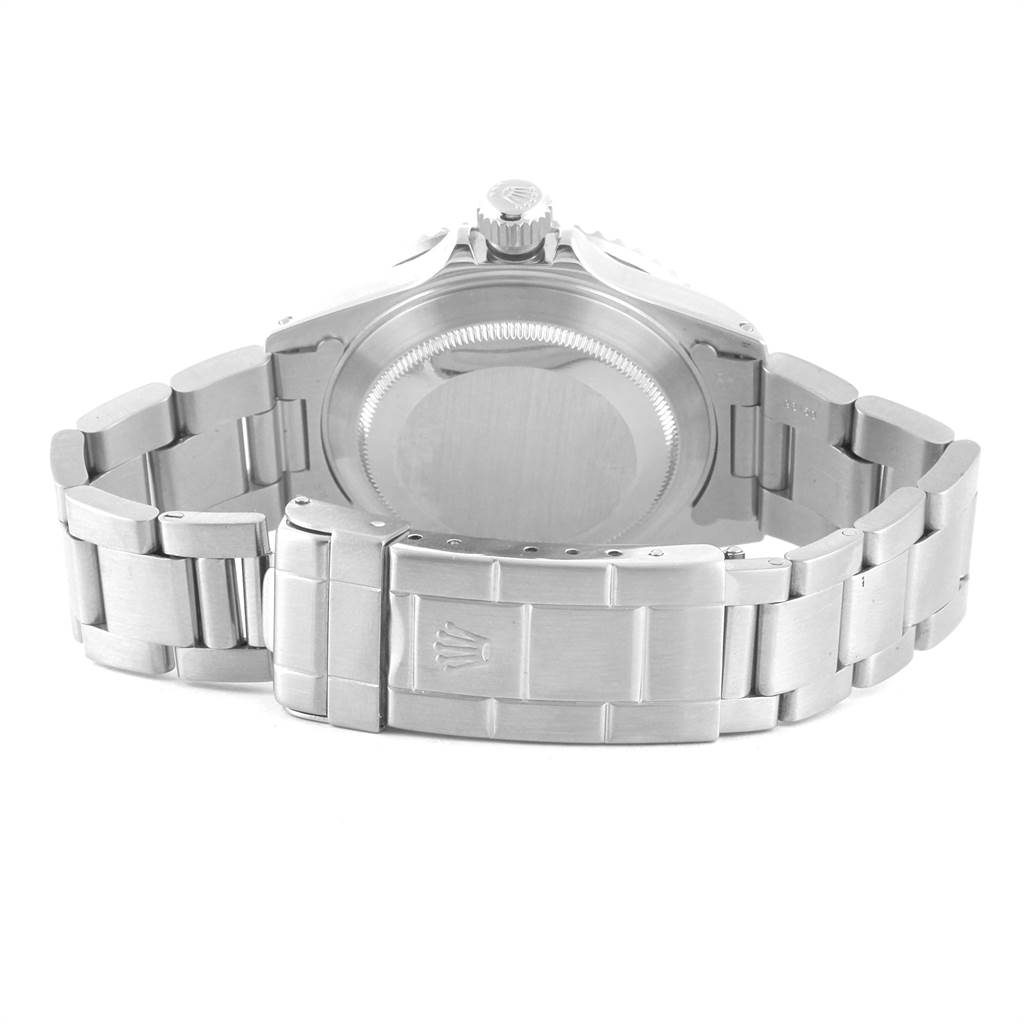 The image shows the back case and metal bracelet of a Rolex Submariner 16610 Men's Stainless Steel Black Dial 16610 Men's Stainless Steel Black Dial watch.