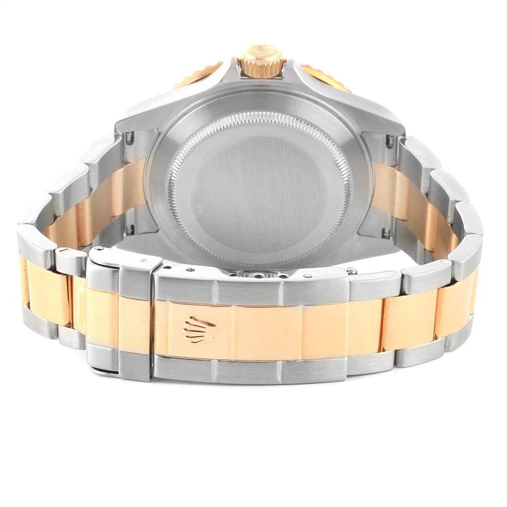 The image shows the back case and bracelet clasp of a Rolex Submariner 16613 Men's Steel and Gold (two tone) Black Dial 16613 Men's Steel and Gold (two tone) Black Dial watch, viewed from the rear.