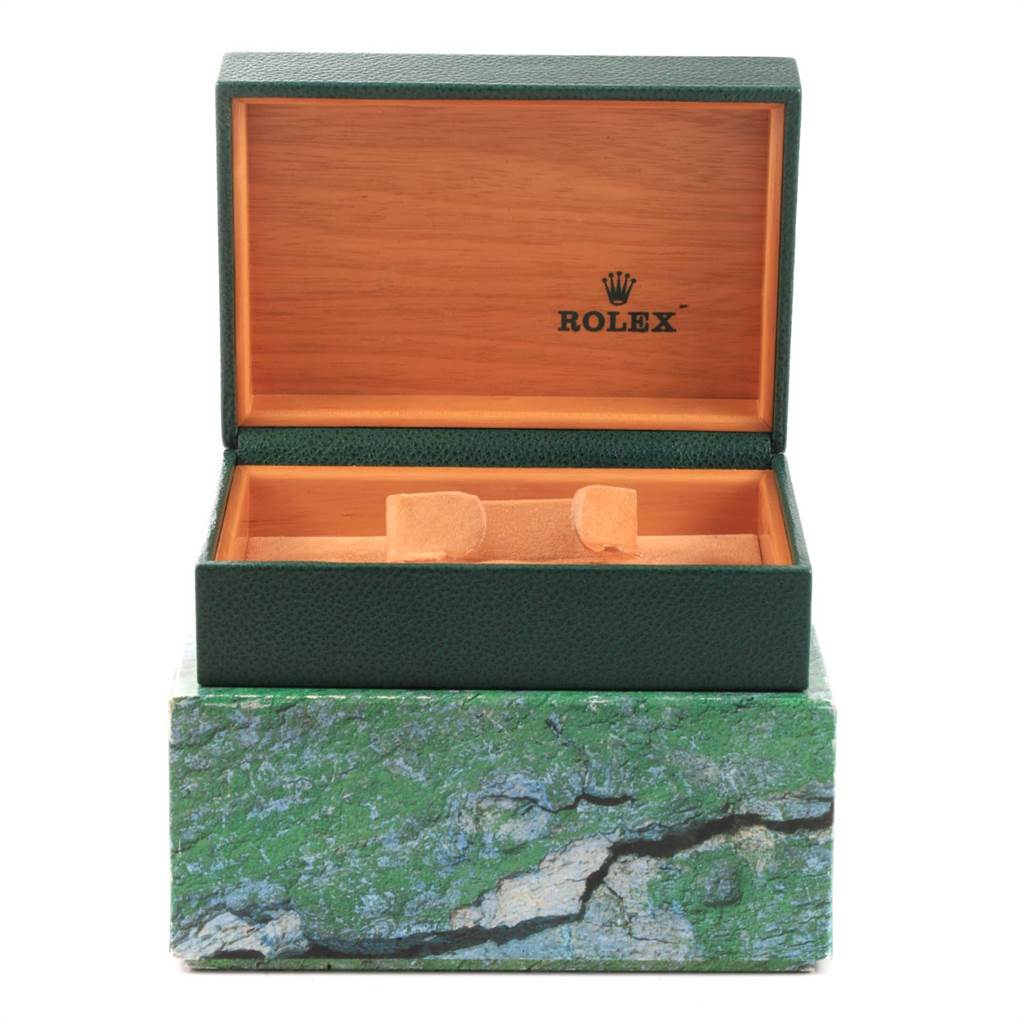 The image shows the open green leather Rolex Submariner 16613 Men's Steel and Gold (two tone) Blue Dial 16613 Men's Steel and Gold (two tone) Blue Dial watch box with a wooden interior.