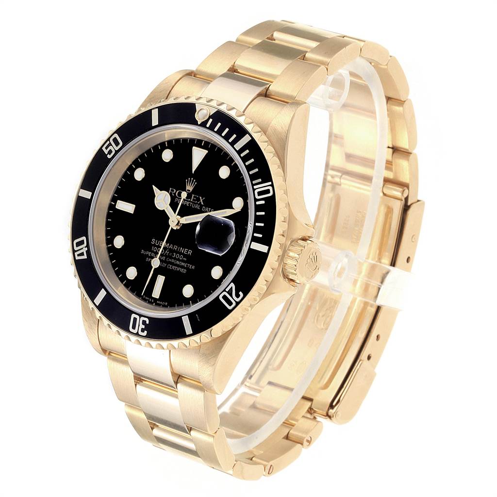 This image shows a Rolex Submariner 16618 Men
s Yellow Gold Black Dial 16618 Men
s Yellow Gold Black Dial watch at a 3/4 right angle, highlighting the black dial, bezel, and gold bracelet.