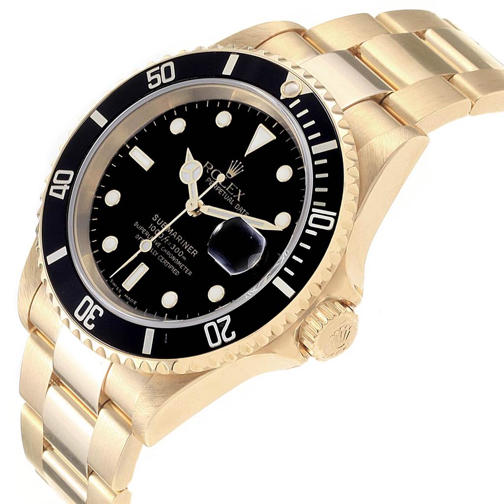 The image shows a Rolex Submariner 16618 Men
s Yellow Gold Black Dial 16618 Men
s Yellow Gold Black Dial watch at a three-quarter angle, highlighting the gold case, black bezel, and black dial with luminescent markers.