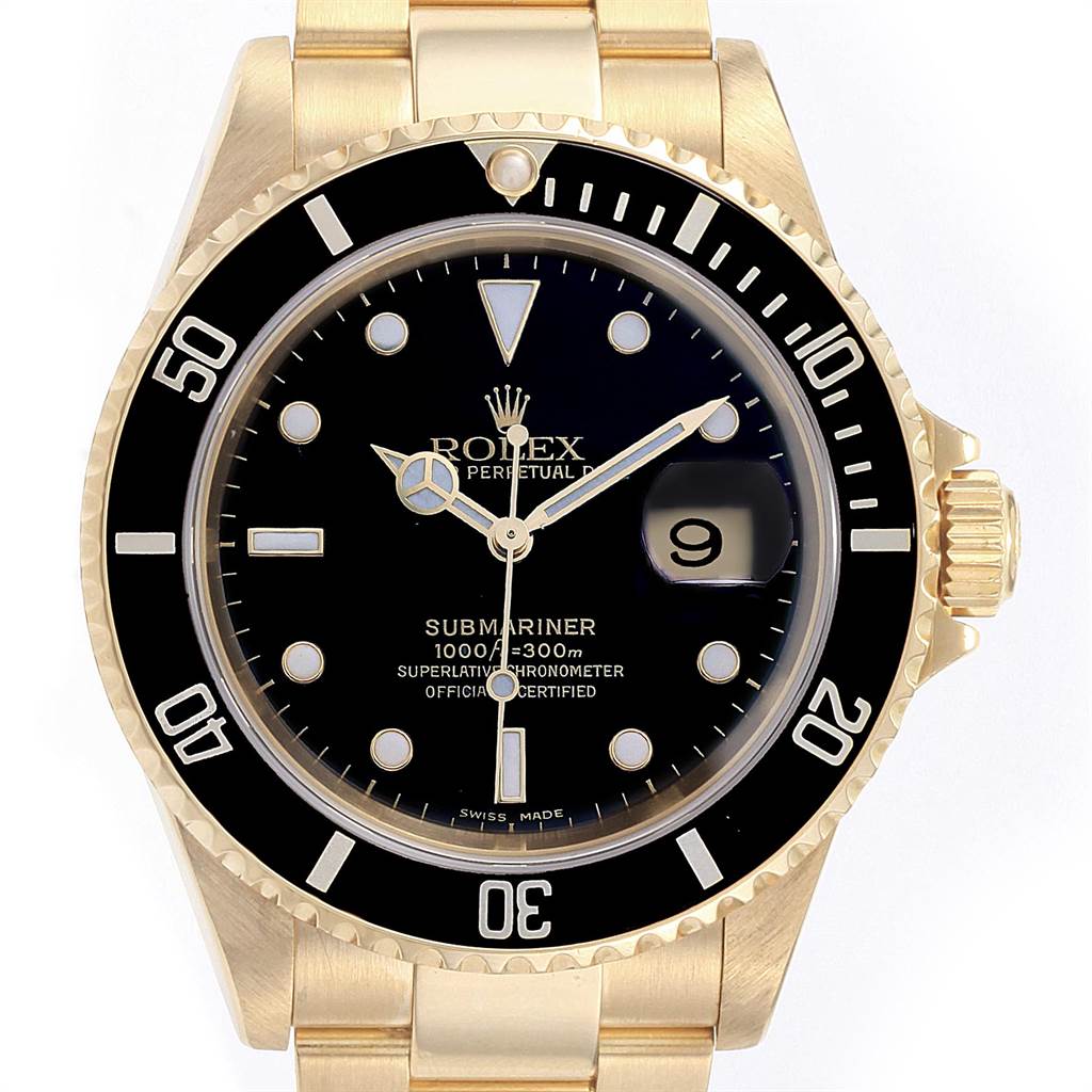 The image shows a front view of a Rolex Submariner 16618 Men
s Yellow Gold Black Dial 16618 Men
s Yellow Gold Black Dial watch, highlighting the bezel, dial, hands, bracelet, and crown.