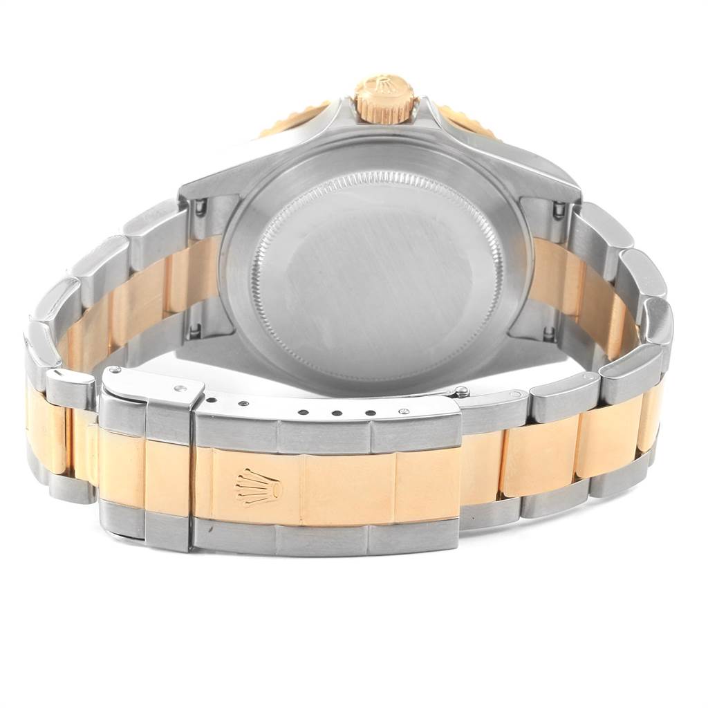 This image shows the back casing and strap of a Rolex Submariner 16613 Men
s Steel and Gold (two tone) Grey Dial 16613 Men
s Steel and Gold (two tone) Grey Dial watch, highlighting the two-tone metal design.