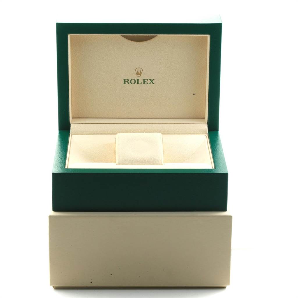 The image shows the open green and beige box of a Rolex Submariner 116610LV Men
s Stainless Steel Green Dial 116610LV Men
s Stainless Steel Green Dial watch from a front angle.
