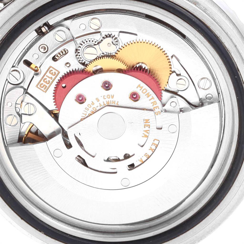 This image shows the internal movement mechanism of a Rolex Submariner 16610 Men
s Stainless Steel Black Dial 16610 Men
s Stainless Steel Black Dial watch from a top-down angle.