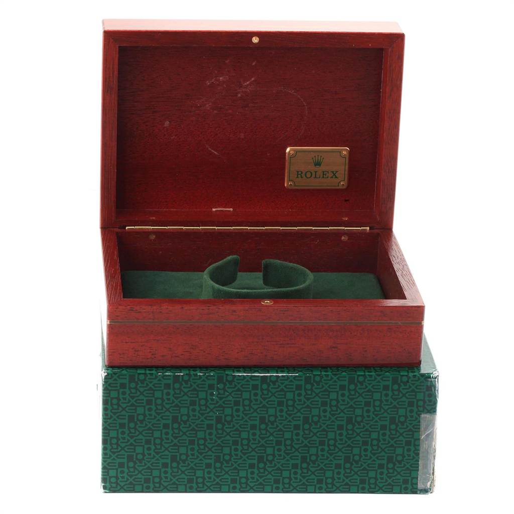 This image shows an open Rolex Submariner 16618 Men
s Yellow Gold Blue Dial 16618 Men
s Yellow Gold Blue Dial watch box at a straight-on angle, revealing its interior.