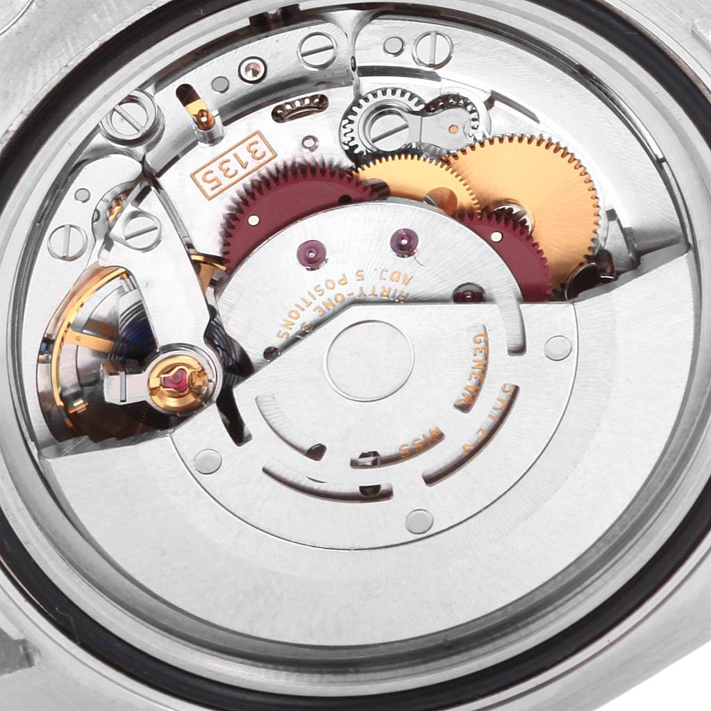 The image shows a close-up view of the inner mechanical movement of a Rolex Submariner 116613 Men's Steel and Gold (two tone) Black Dial 116613 Men's Steel and Gold (two tone) Black Dial watch.