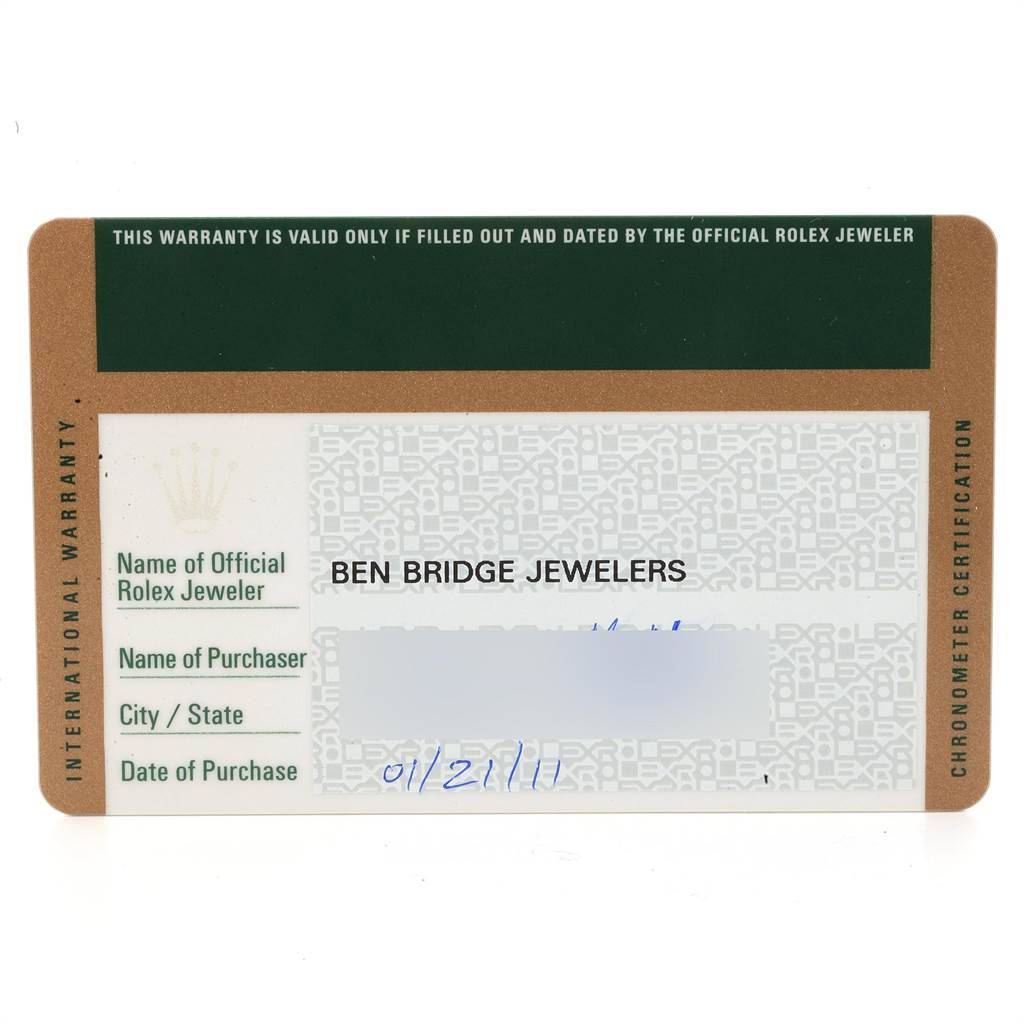 This image shows a filled-out international warranty card for the Rolex Submariner 116613 Men's Steel and Gold (two tone) Blue Dial 116613 Men's Steel and Gold (two tone) Blue Dial model.