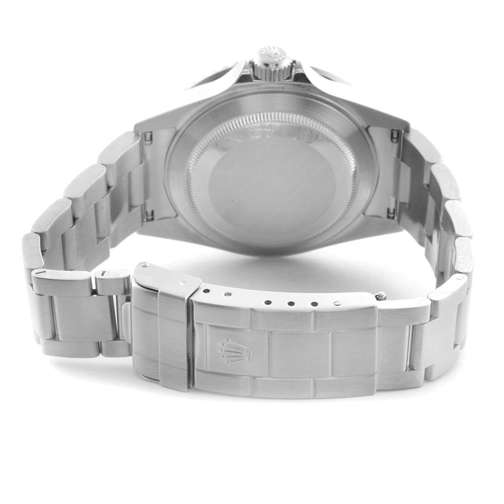 The image shows the back view of a Rolex Submariner 16610 Men
s Stainless Steel Black Dial 16610 Men
s Stainless Steel Black Dial, highlighting its case back and bracelet with the clasp.