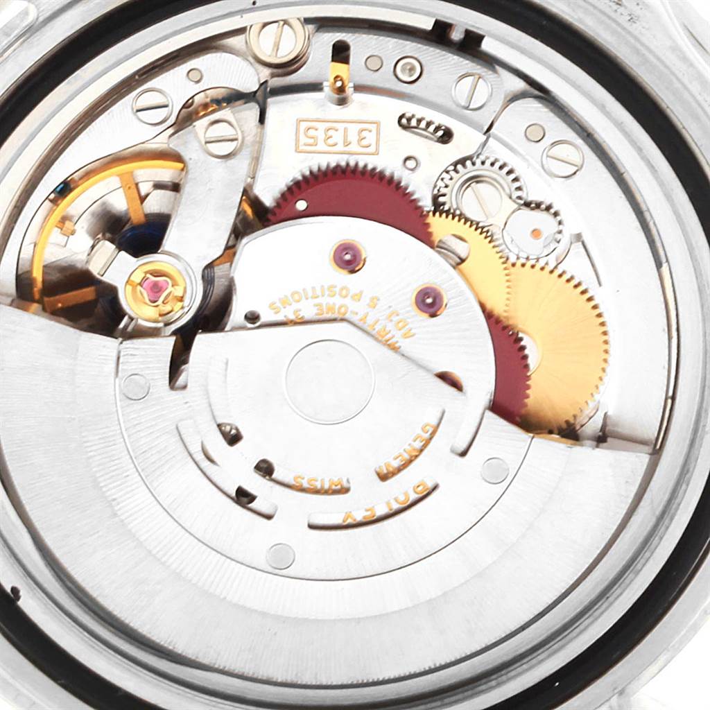 The image shows the internal movement mechanism of a Rolex Submariner 16610 Men
s Stainless Steel Black Dial 16610 Men
s Stainless Steel Black Dial watch, viewed from the back.