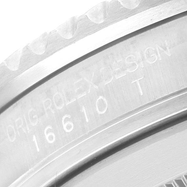 This close-up image shows the engraving on the bezel and case side of a Rolex Submariner 16610 Men
s Stainless Steel Black Dial 16610 Men
s Stainless Steel Black Dial model 16610.