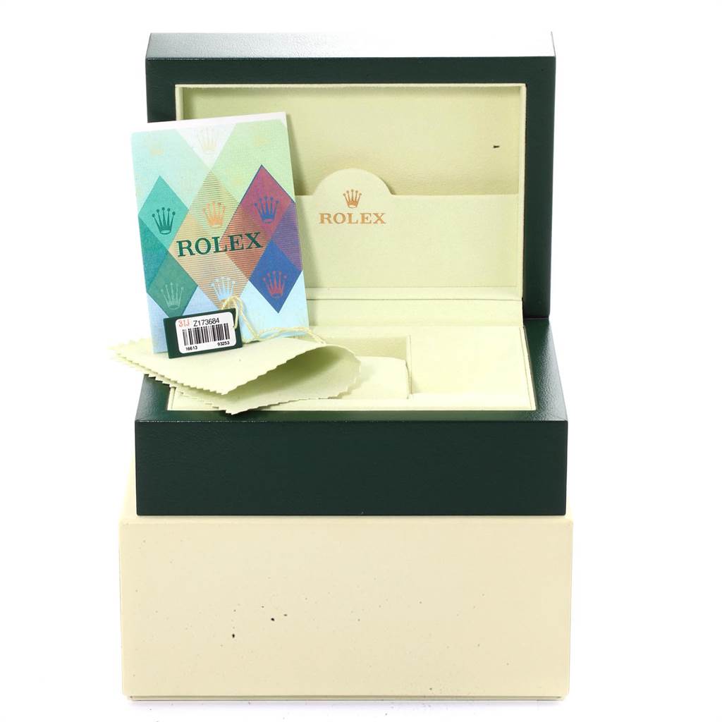 The image shows the box, booklet, and accessories for a Rolex Submariner 16613 Men
s Steel and Gold (two tone) Champagne Dial 16613 Men
s Steel and Gold (two tone) Champagne Dial watch, viewed from the front.