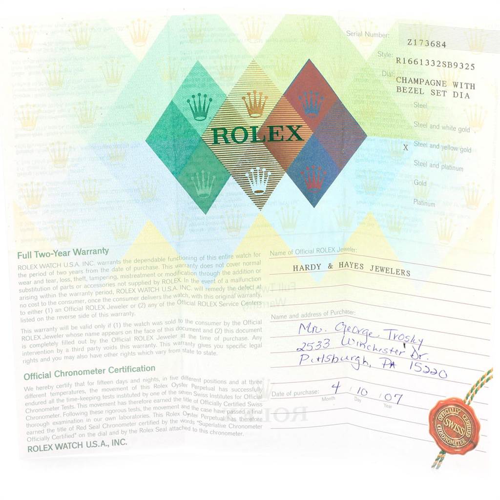 The image shows a warranty card for a Rolex Submariner 16613 Men
s Steel and Gold (two tone) Champagne Dial 16613 Men
s Steel and Gold (two tone) Champagne Dial watch.