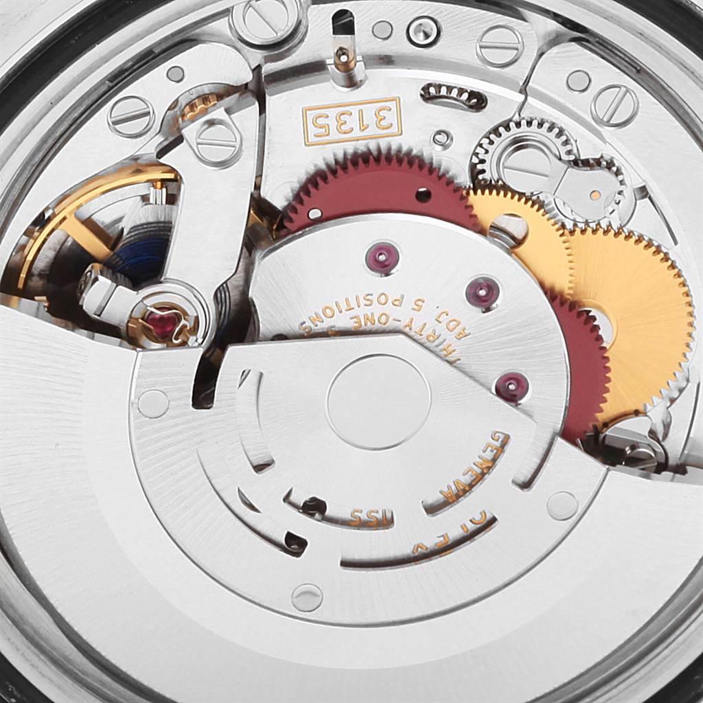 This image shows a close-up view of the internal movement mechanism of a Rolex Submariner 116610 Men
s Stainless Steel Black Dial 116610 Men
s Stainless Steel Black Dial watch from the back.