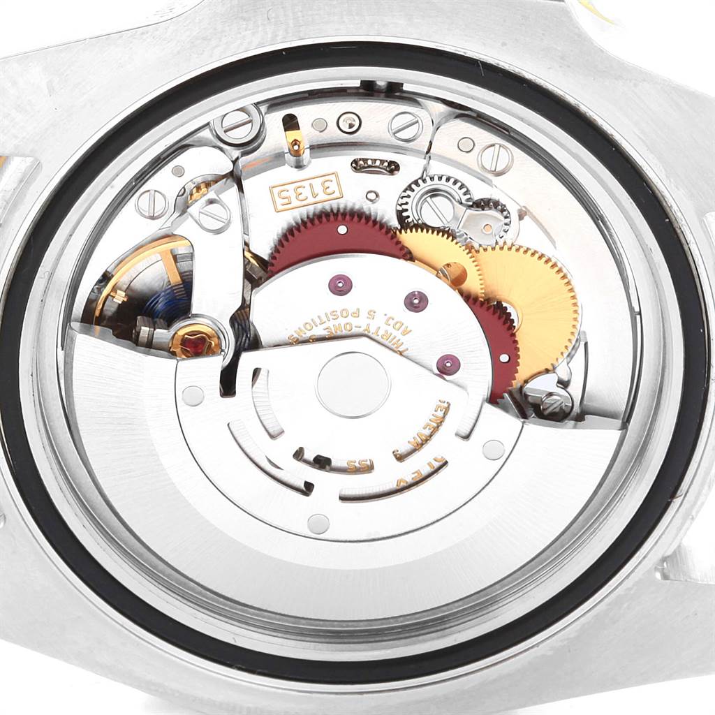 This is an image of the internal mechanism of a Rolex Submariner 116613 Men's Steel and Gold (two tone) Black Dial 116613 Men's Steel and Gold (two tone) Black Dial watch, viewed from the back.