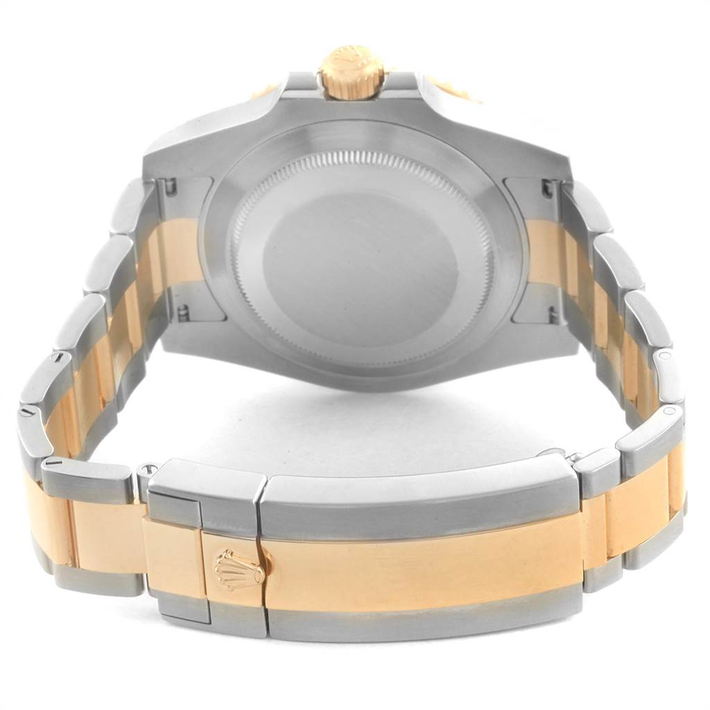 The image shows the back case and bracelet of a Rolex Submariner 116613 Men's Steel and Gold (two tone) Black Dial 116613 Men's Steel and Gold (two tone) Black Dial watch, viewed from behind.