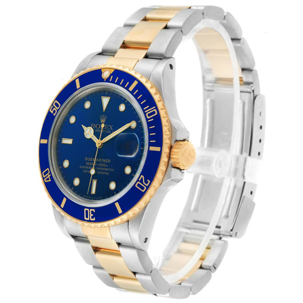 The image shows a Rolex Submariner 16803 Men
s Steel and Gold (two tone) Blue Dial 16803 Men
s Steel and Gold (two tone) Blue Dial watch at a three-quarter angle, displaying the face, bezel, crown, and bracelet.