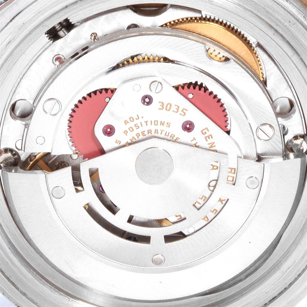 The image shows the internal movement mechanism of a Rolex Submariner 16803 Men
s Steel and Gold (two tone) Blue Dial 16803 Men
s Steel and Gold (two tone) Blue Dial watch, viewed from the back.
