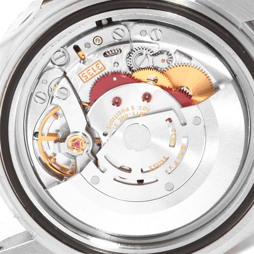 The image shows the internal mechanical movement of a Rolex Submariner 16610 Men
s Stainless Steel Black Dial 16610 Men
s Stainless Steel Black Dial watch from a top-down angle.