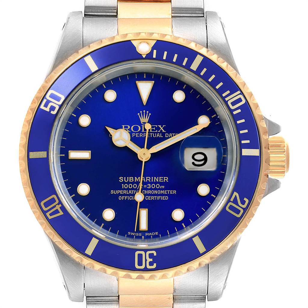 This Rolex Submariner 16613 Men
s Steel and Gold (two tone) Blue Dial 16613 Men
s Steel and Gold (two tone) Blue Dial watch is shown from a front angle, highlighting its blue dial, gold bezel, and two-tone bracelet.