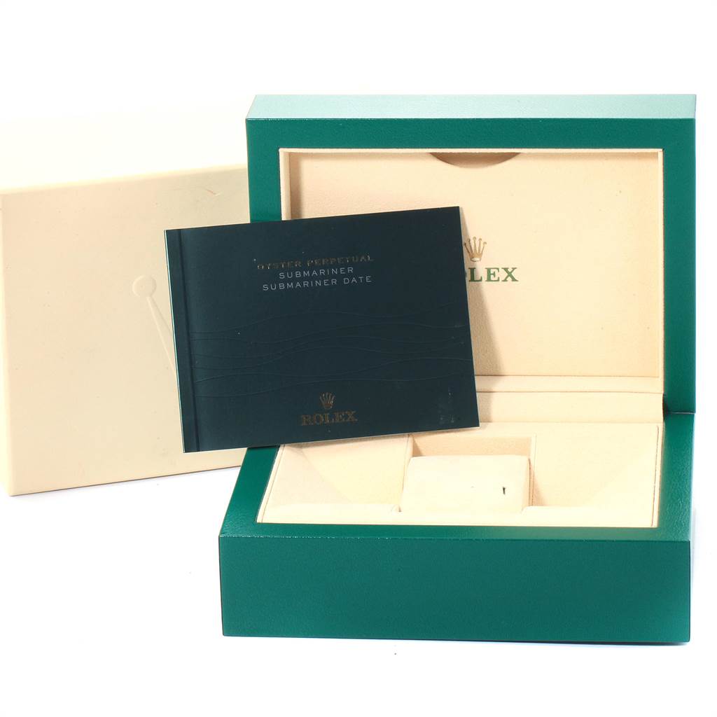 This image shows the packaging box and manual for a Rolex Submariner 116610LV Men
s Stainless Steel Green Dial 116610LV Men
s Stainless Steel Green Dial watch.