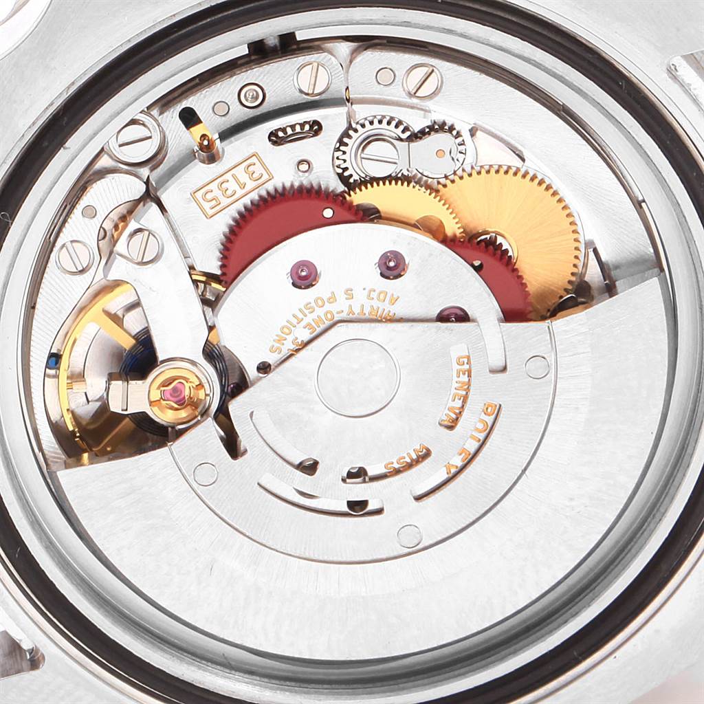 This image shows a close-up view of the Rolex Submariner 116610LV Men
s Stainless Steel Green Dial 116610LV Men
s Stainless Steel Green Dial
s movement and internal mechanisms.