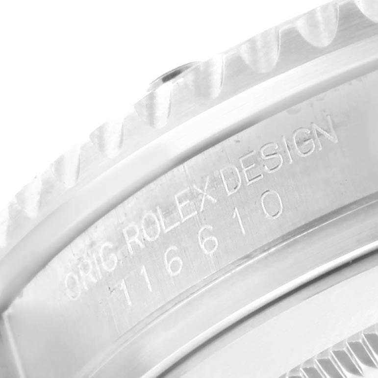 The image shows a close-up angle of the side of a Rolex Submariner 116610LV Men
s Stainless Steel Green Dial 116610LV Men
s Stainless Steel Green Dial watch, highlighting the bezel and engravings.