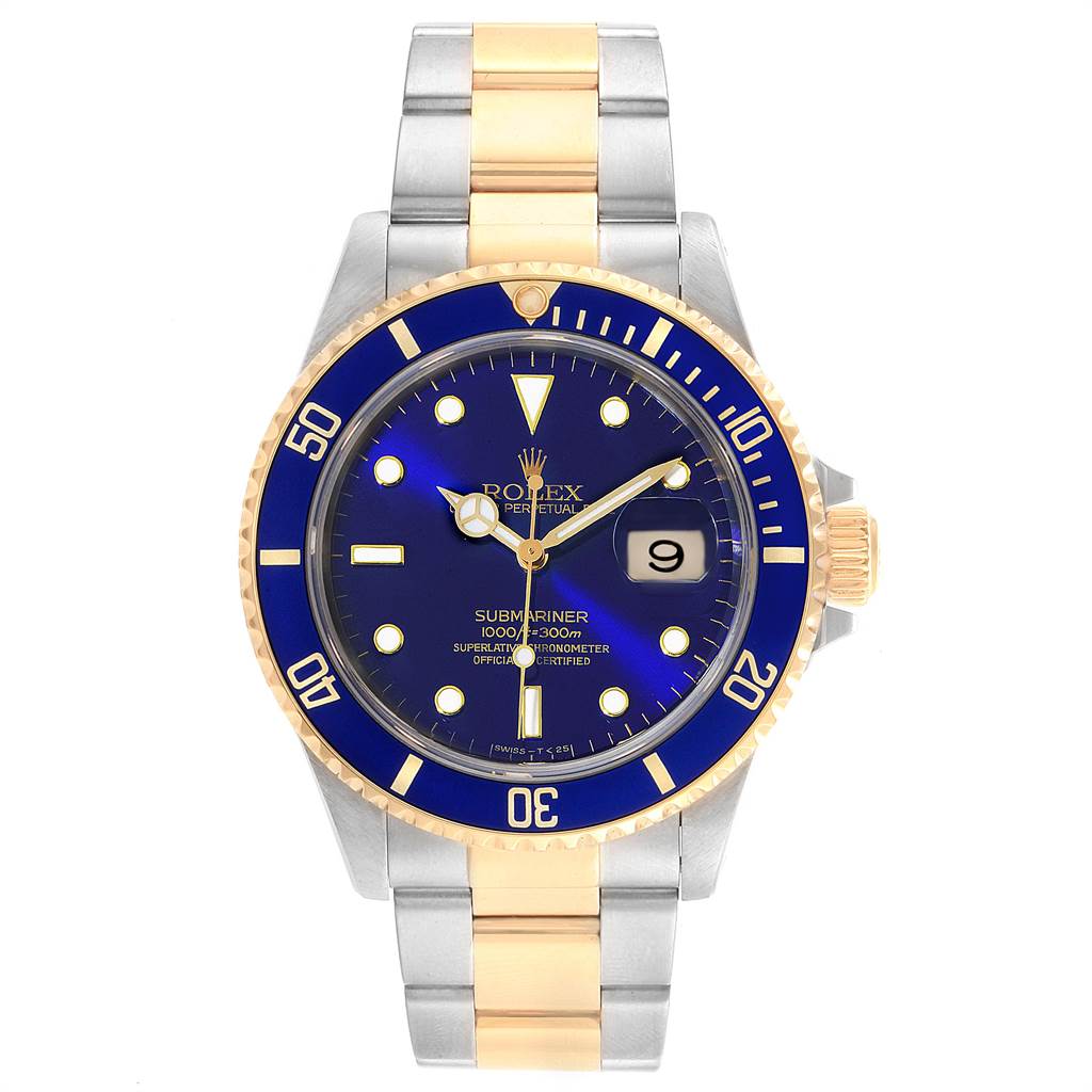 The image shows a Rolex Submariner 16613 Men's Steel and Gold (two tone) Blue Dial 16613 Men's Steel and Gold (two tone) Blue Dial watch, from a top-down angle, highlighting the face, bezel, and two-tone metal bracelet.