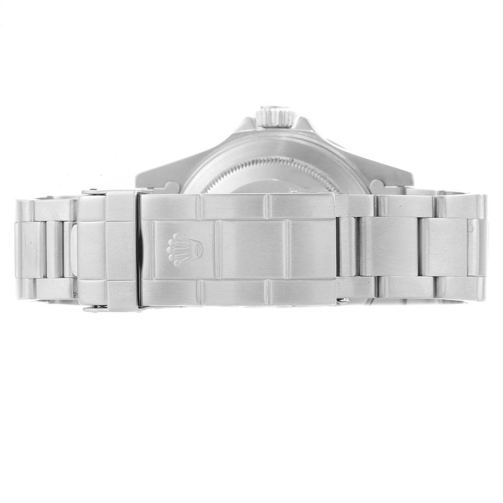 This image shows the back and clasp of a Rolex Submariner 14060 Men
s Stainless Steel Black Dial 14060 Men
s Stainless Steel Black Dial watch from a horizontal angle.