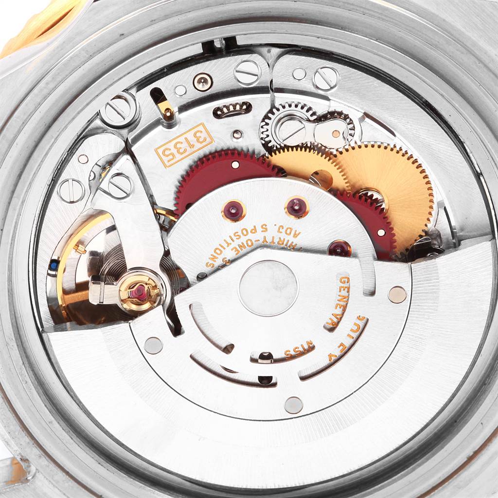 This image shows the movement and gears of a Rolex Submariner 16613 Men
s Steel and Gold (two tone) Grey Dial 16613 Men
s Steel and Gold (two tone) Grey Dial watch, viewed from the back case angle.