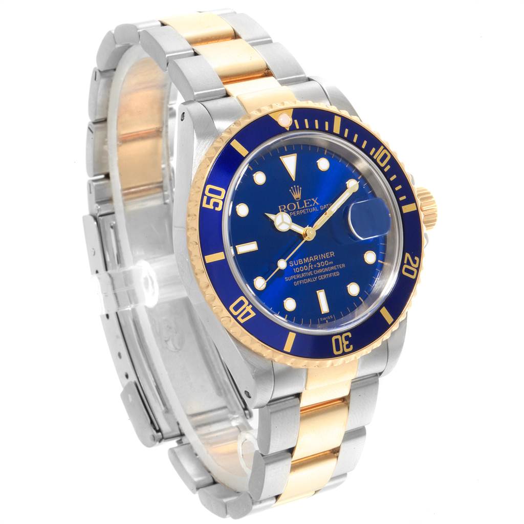 The Rolex Submariner 16613 Men
s Steel and Gold (two tone) Blue Dial 16613 Men
s Steel and Gold (two tone) Blue Dial model is shown at an angle displaying its blue dial, bezel, and two-tone metal bracelet.