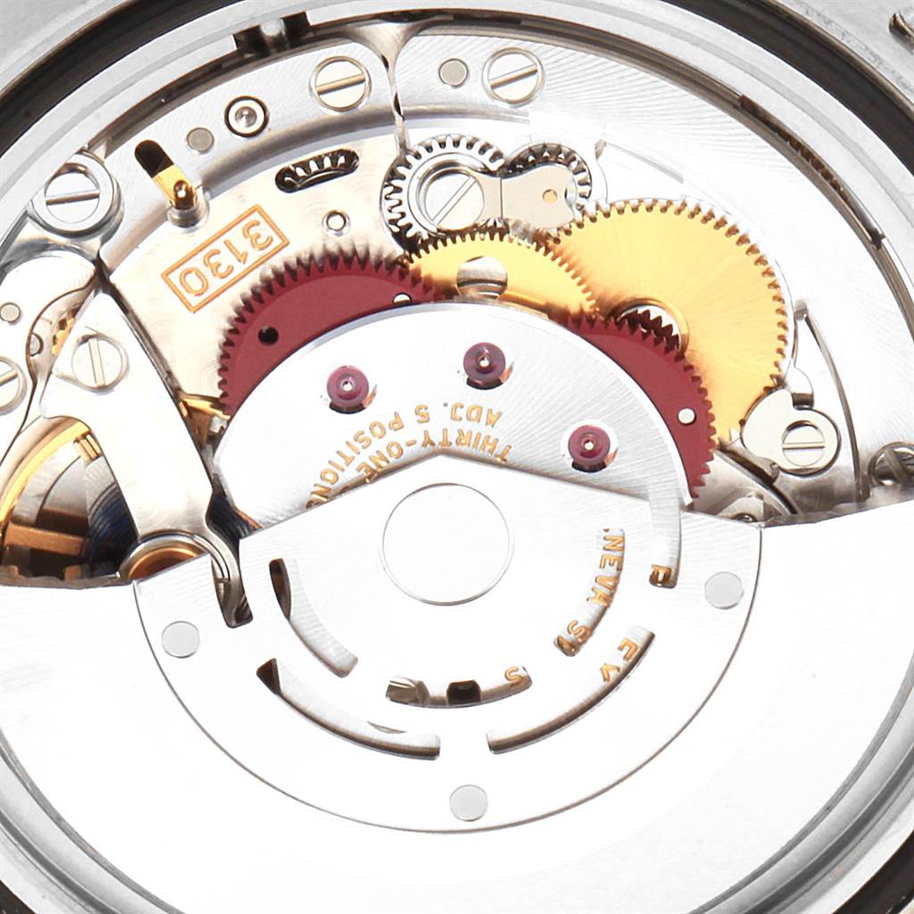 The image shows a close-up view of the movement mechanism of the Rolex Submariner 114060 Men
s Stainless Steel Black Dial 114060 Men
s Stainless Steel Black Dial watch.