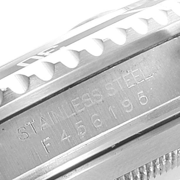 This image shows a close-up of the stainless steel case and bezel of a Rolex Submariner 16610LV Men
s Stainless Steel Black Dial 16610LV Men
s Stainless Steel Black Dial watch.