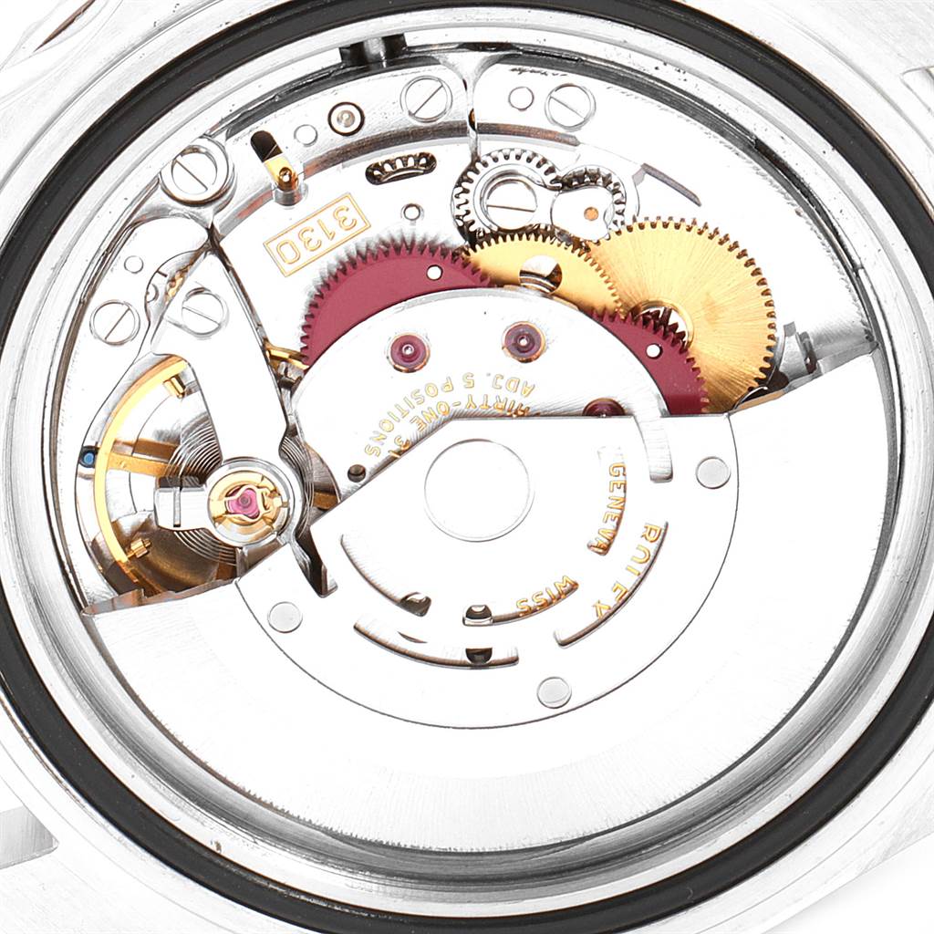 This image shows the internal movement mechanism of the Rolex Submariner 14060 Men
s Stainless Steel Black Dial 14060 Men
s Stainless Steel Black Dial watch from a close-up, top-down angle.