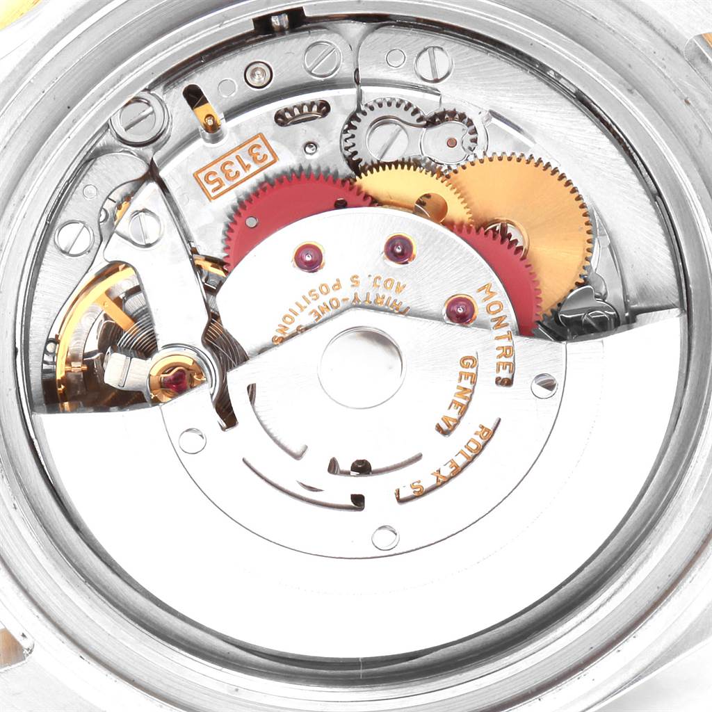 This image shows the internal mechanism and gears of a Rolex Submariner 16613 Men
s Steel and Gold (two tone) Blue Dial 16613 Men
s Steel and Gold (two tone) Blue Dial watch from a top-down angle.