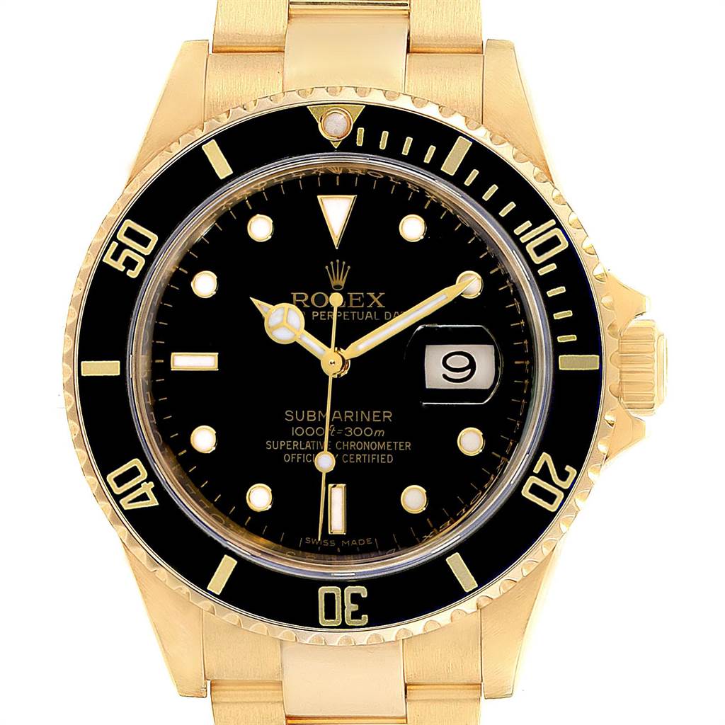 The image shows a front view of a Rolex Submariner 16618 Men
s Yellow Gold Black Dial 16618 Men
s Yellow Gold Black Dial watch, highlighting the bezel, dial, hands, and part of the bracelet.