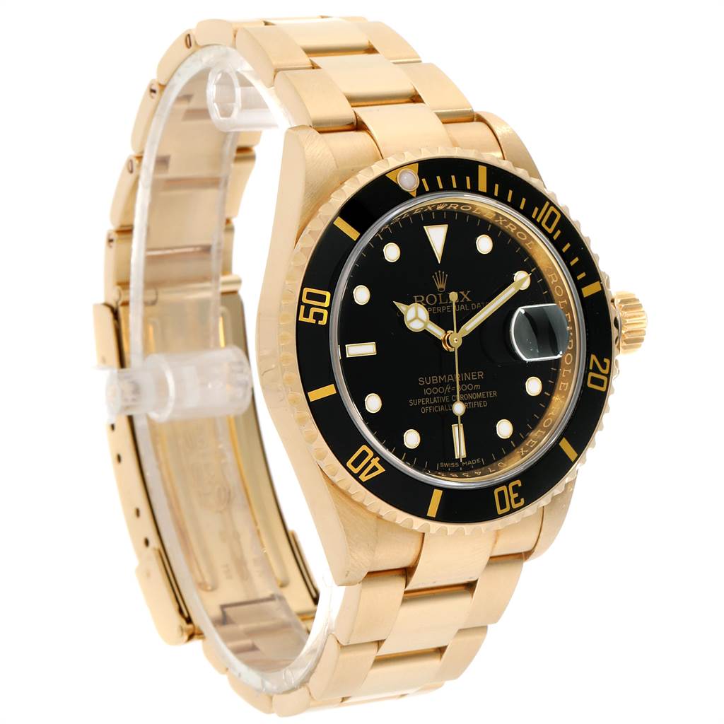 This image shows a Rolex Submariner 16618 Men
s Yellow Gold Black Dial 16618 Men
s Yellow Gold Black Dial watch at a slight angle, displaying the face, bezel, bracelet, and crown.