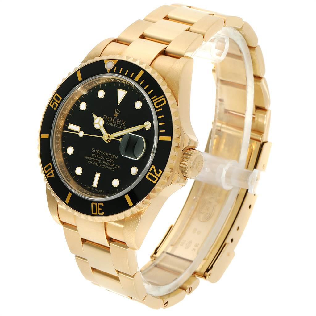 The image shows a Rolex Submariner 16618 Men
s Yellow Gold Black Dial 16618 Men
s Yellow Gold Black Dial watch at a three-quarter angle, highlighting the dial, bezel, and part of the bracelet.