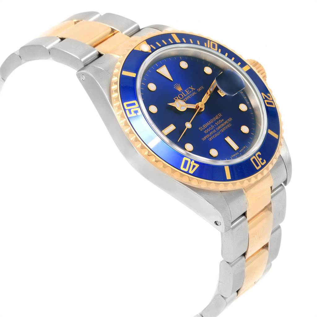 This image shows an angled view of a Rolex Submariner 16613 Men
s Steel and Gold (two tone) Blue Dial 16613 Men
s Steel and Gold (two tone) Blue Dial, highlighting its blue dial, bezel, and two-tone stainless steel and gold bracelet.