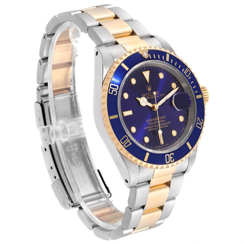 The Rolex Submariner 16613 Men
s Steel and Gold (two tone) Blue Dial 16613 Men
s Steel and Gold (two tone) Blue Dial watch is shown at an angled side view, highlighting its stainless steel and gold bracelet, and blue dial.