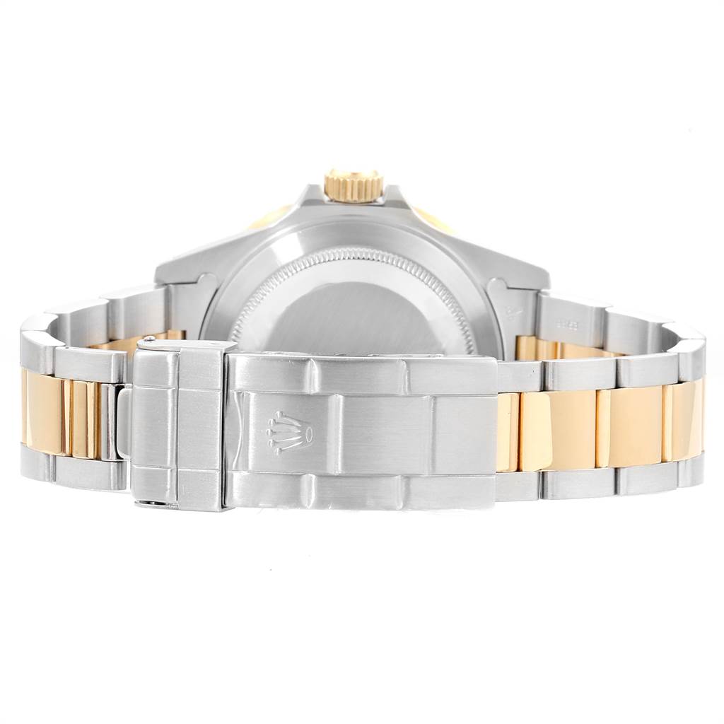 This image shows the back case and bracelet of the Rolex Submariner 16613 Men
s Steel and Gold (two tone) Blue Dial 16613 Men
s Steel and Gold (two tone) Blue Dial watch, including the clasp and crown.