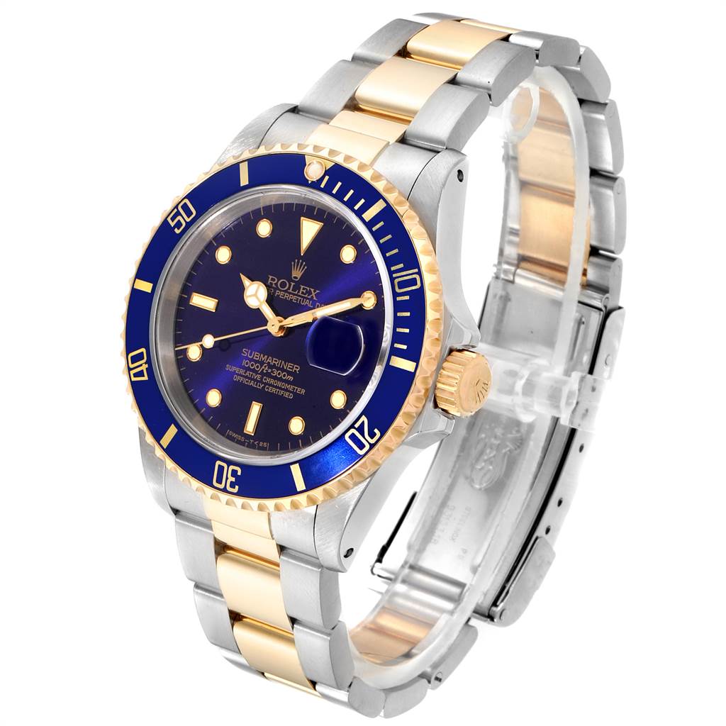 The image shows a Rolex Submariner 16613 Men
s Steel and Gold (two tone) Blue Dial 16613 Men
s Steel and Gold (two tone) Blue Dial watch angled to display its face, bezel, crown, and bracelet.
