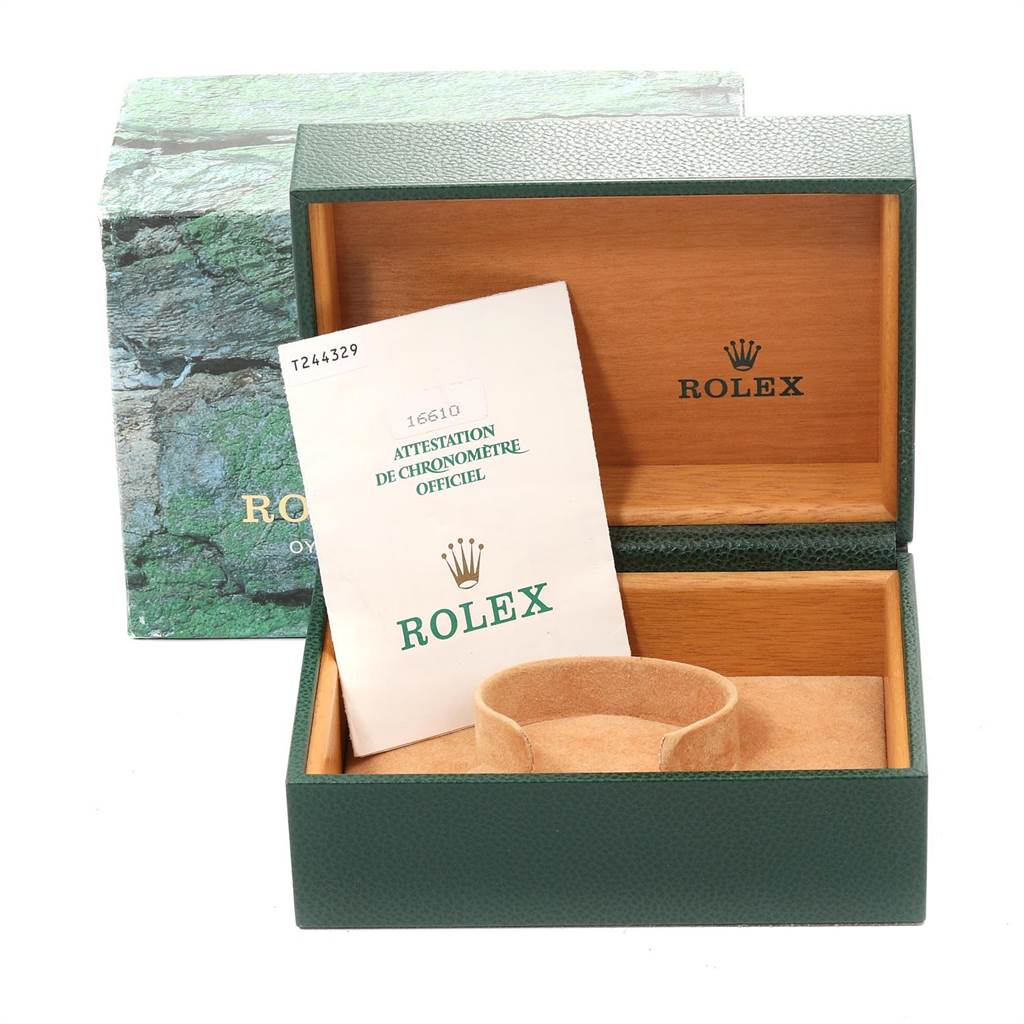 The image shows an open box for a Rolex Submariner 16610 Men
s Stainless Steel Black Dial 16610 Men
s Stainless Steel Black Dial watch with an Best Quality
ation certificate inside.