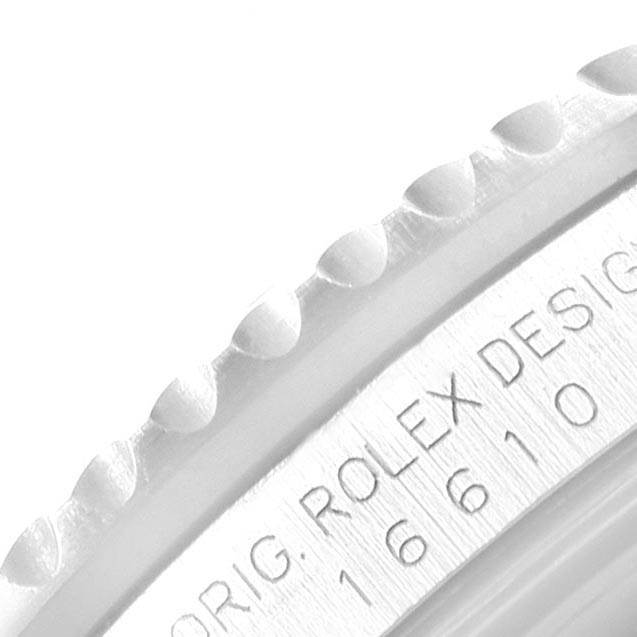 This image shows a close-up angle of the bezel and the engraved case side of the Rolex Submariner 16610 Men
s Stainless Steel Black Dial 16610 Men
s Stainless Steel Black Dial watch.