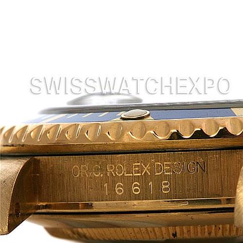 This close-up side view shows the case, bezel, and part of the crown of the Rolex Submariner 16618 Men's Stainless Steel Blue Dial 16618 Men's Stainless Steel Blue Dial model 16618, with "Orig. Rolex Design" engraved.