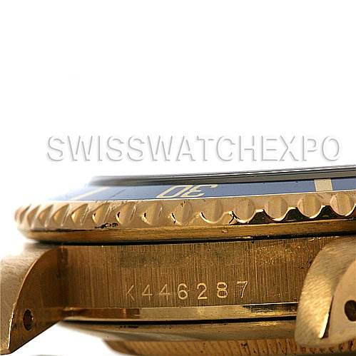 This image shows a side view of the case and bezel of a Rolex Submariner 16618 Men's Stainless Steel Blue Dial 16618 Men's Stainless Steel Blue Dial watch, focusing on the serial number and part of the lugs.