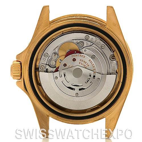 This image shows the inner mechanism and movement of a Rolex Submariner 16618 Men's Stainless Steel Blue Dial 16618 Men's Stainless Steel Blue Dial watch from a rear view, with the case back removed.